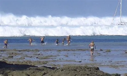 Bathers trying to escape the approaching Tsunami waves.