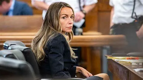 Photo of Karen Read sitting in court.