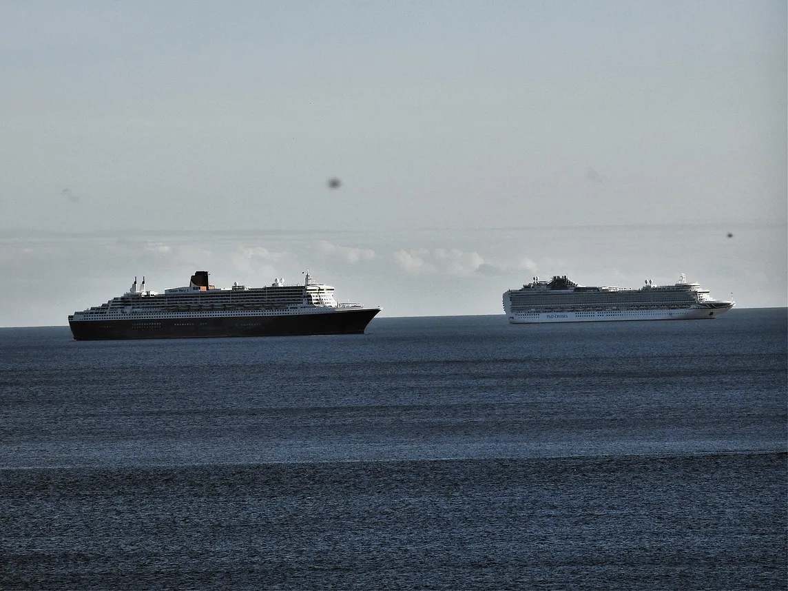 Sphere Objects Captured Above Two Cruise Ships,