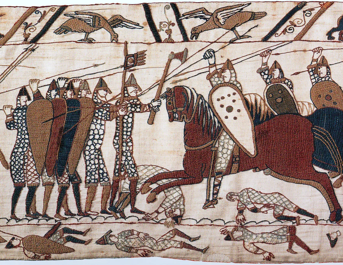 Part of scene 52 of the Bayeux Tapestry. This depicts mounted Normans attacking the Anglo-Saxon infantry.