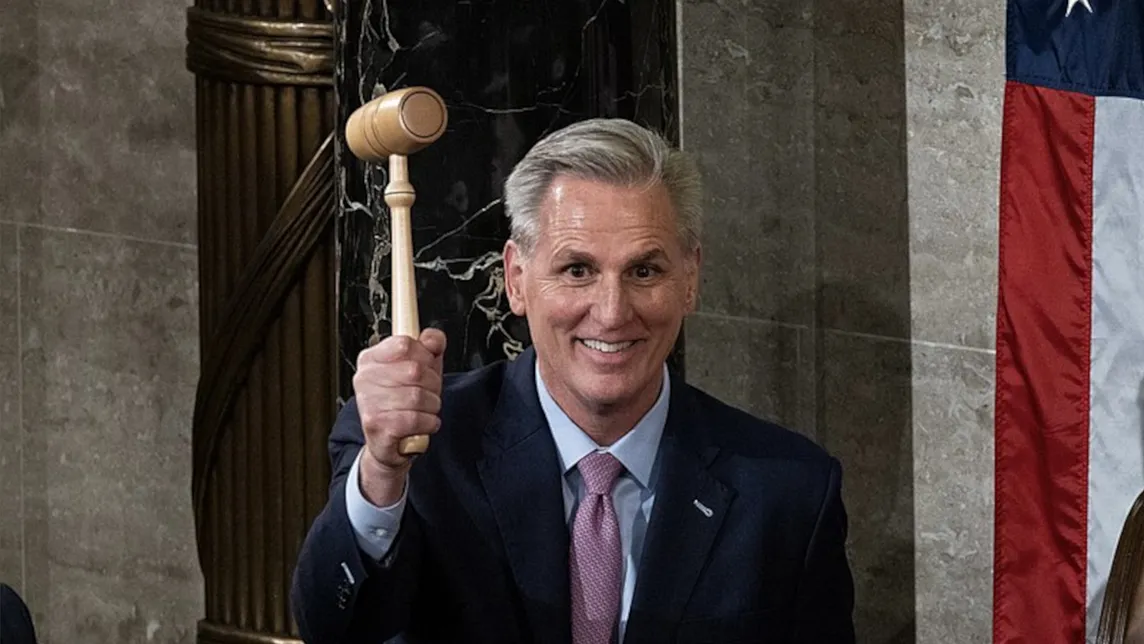Kevin McCarthy holding a gavel and smiling manically