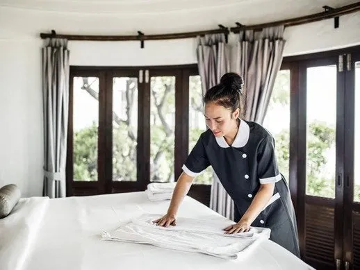 Housekeeping attending to a room