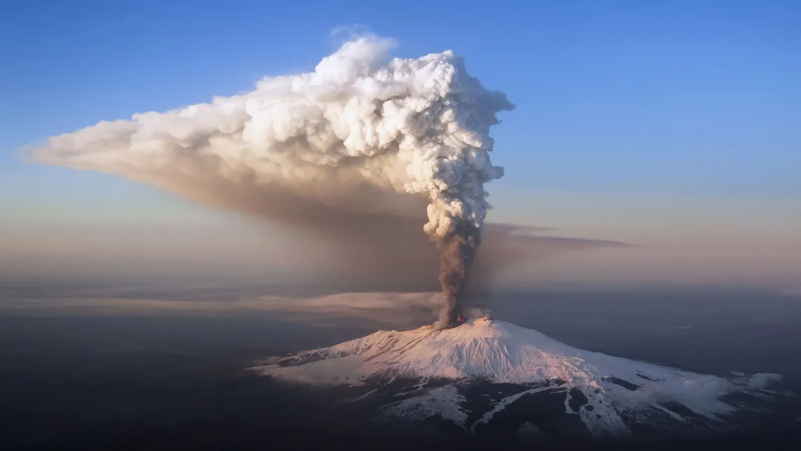 Skiing On The Rumbling Peaks Of An Active Snow-covered Volcano