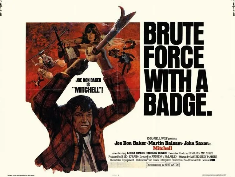 Joe Don Baker struggles to hold a spear, or a bazooka, or something weighing 10 pounds.