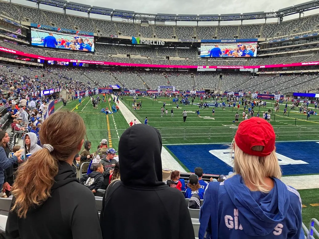 Girls looking at the field at Giants Stadium