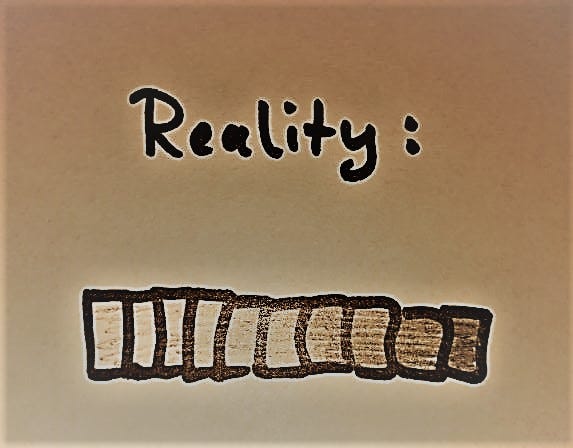 Image is titled "Reality" and shows different shades of grey. 
