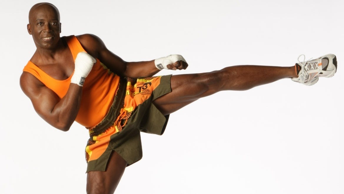 BILLY BLANKS, demonstrating his tae-bo/martial arts moves in
