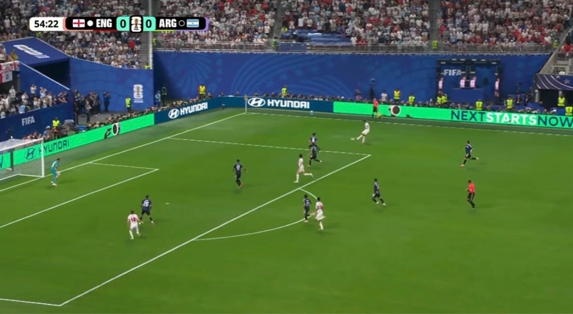 Morgan Rogers delivers the cross after England work the ball into a dangerous wide area.