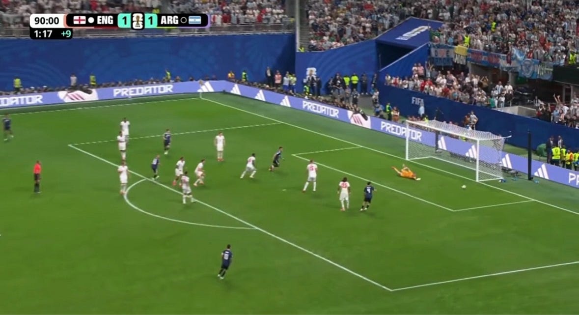 Mac Allister’s shot clips the post as Argentina continue to pressure England around the edge of the area.