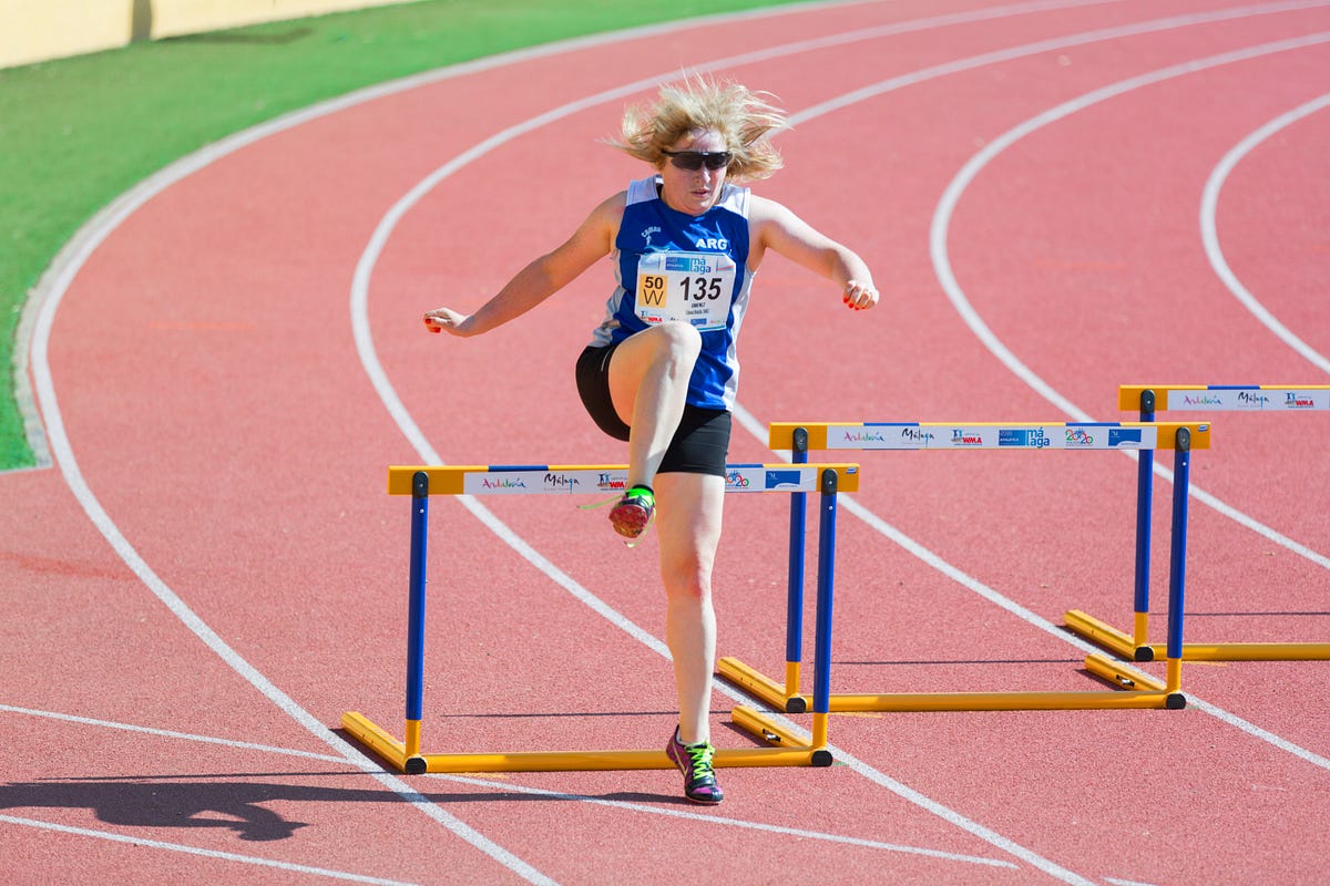 Jumping Over Hurdles. When the Goal is Important | by Warren Brown |  ILLUMINATION | Medium