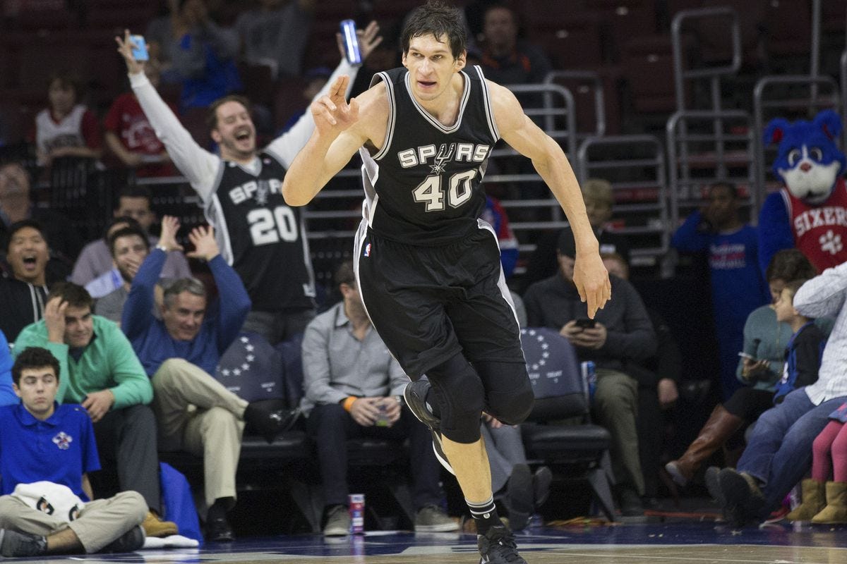 Here are a bunch of photos of Spurs' Boban Marjanovic's hands making  everything look tiny