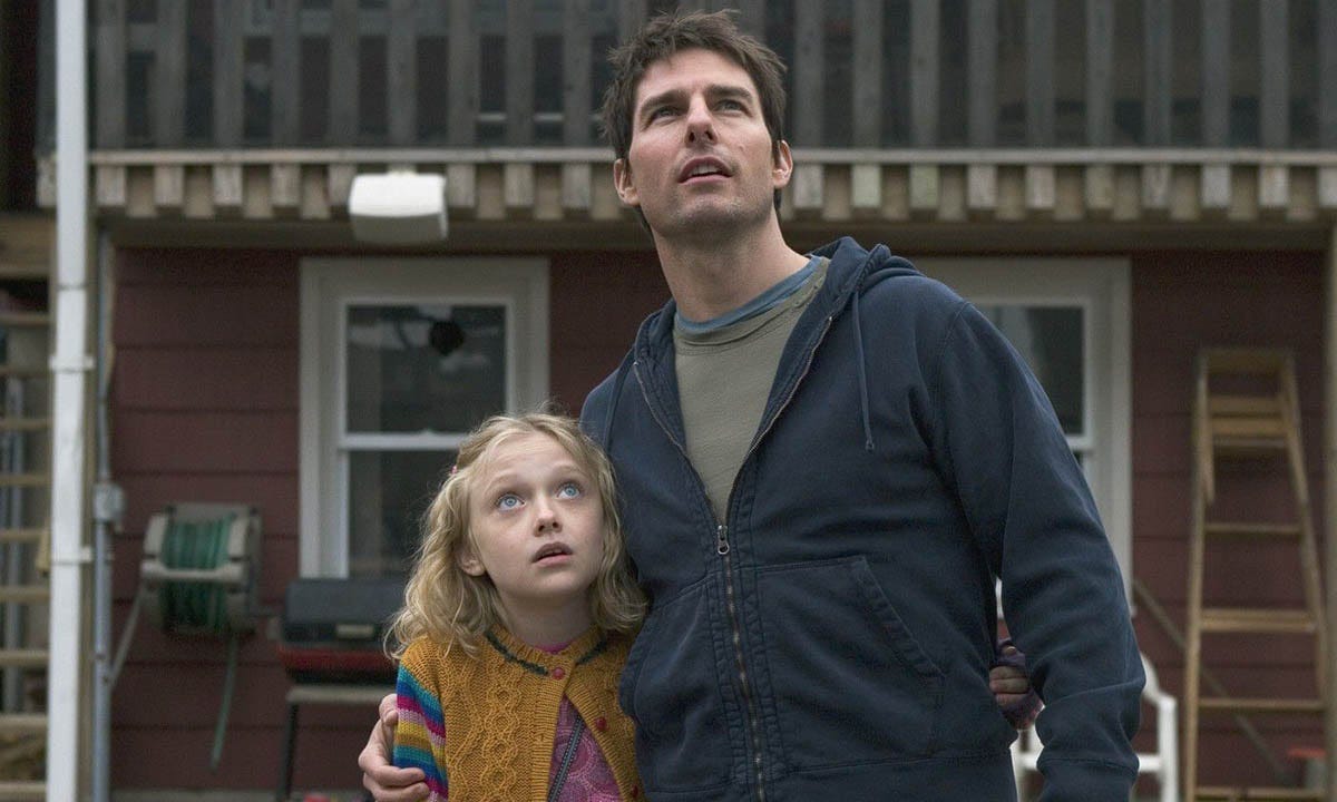 Dakota Fanning and Tom Cruise in Steven Spielberg’s War of the Worlds. Image via Dreamworks/Paramount Pictures.