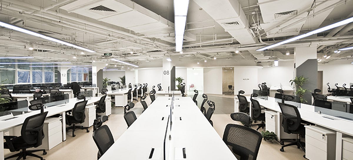 How does office space design impact employee productivity and well