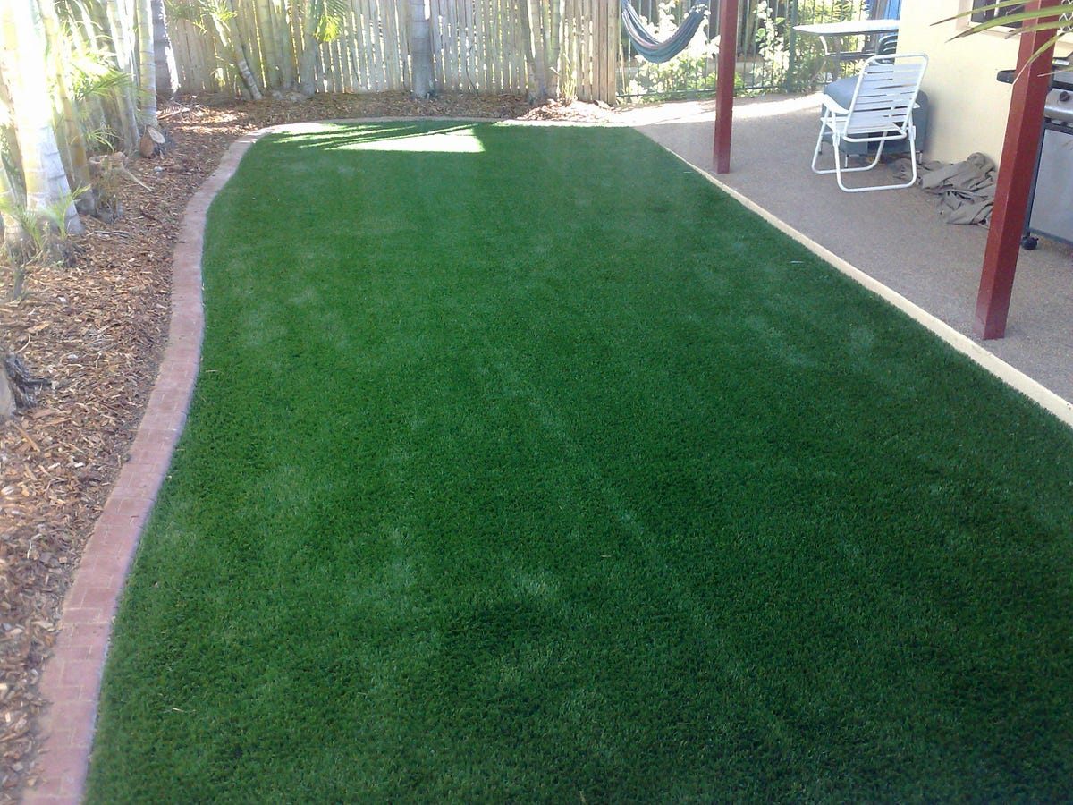 Outdoor Fake Grass Vs Real Grass. Your love for a lush green lawn is