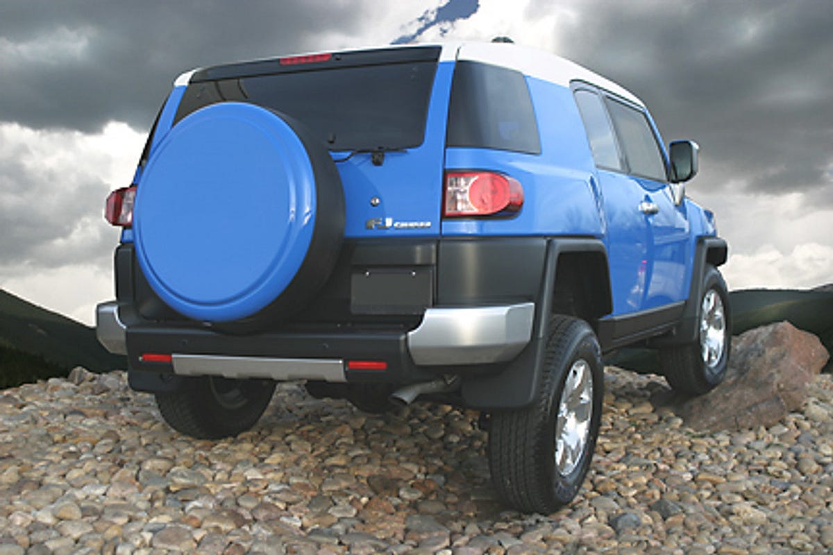 Shop Now Toyota Rigid Tire Cover FJ Cruiser Boomerang Boomrangg