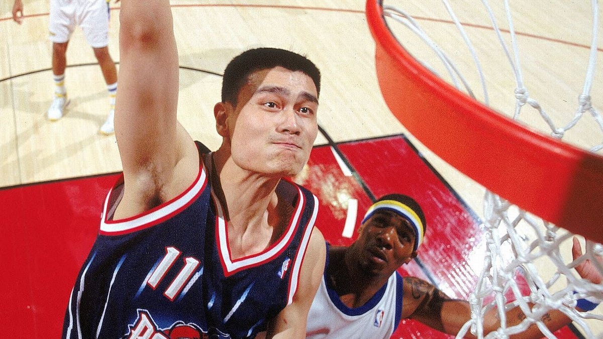 One of these guys played 15 years in the NBA. The other is Yao