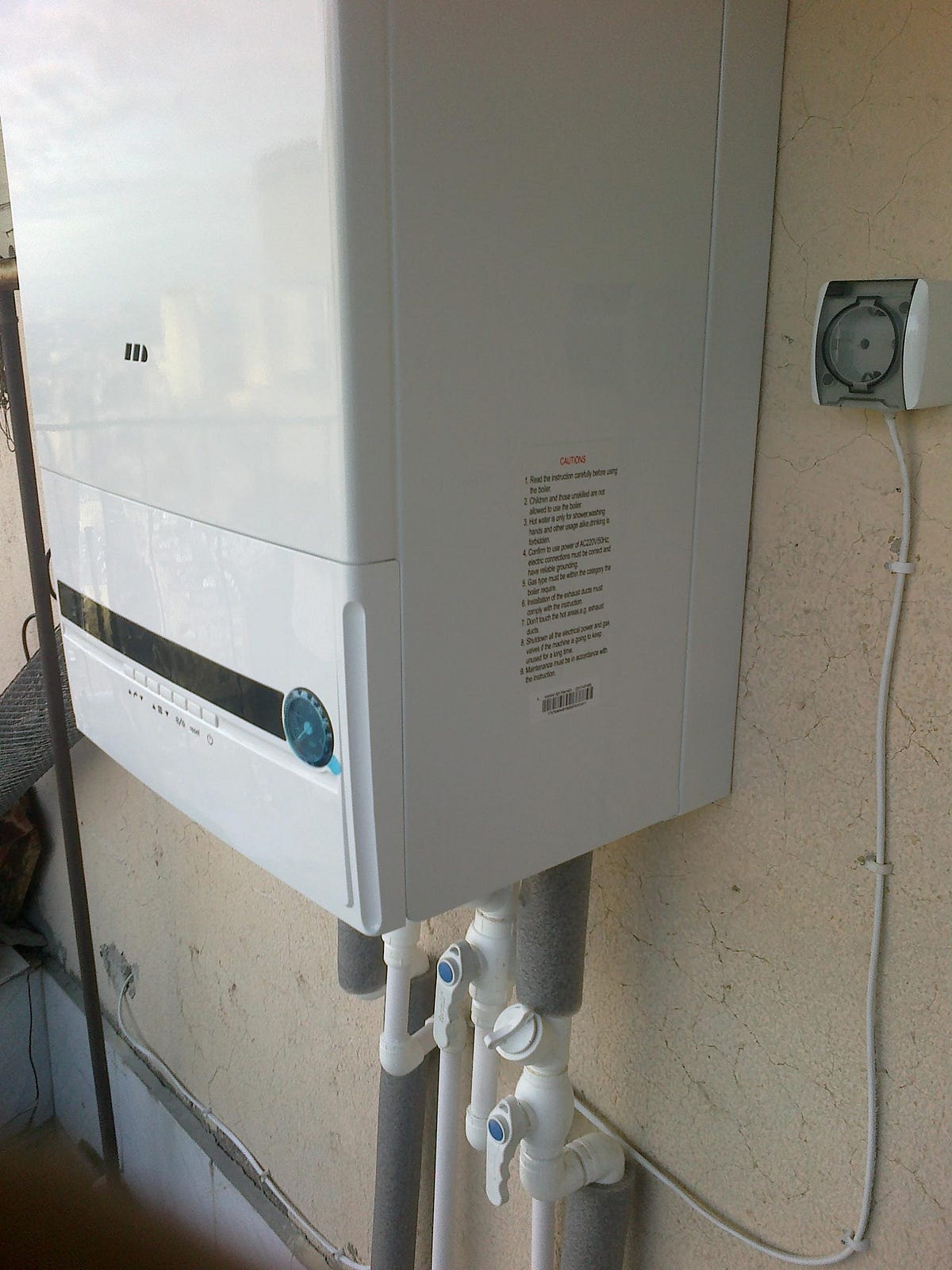 How Does a Tankless Water Heater Work with a Water Softener and