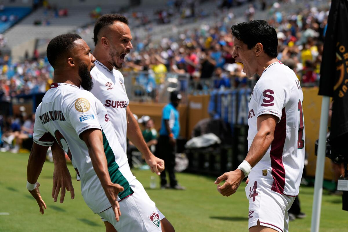 Brazilian club Fluminense’s Samuel Xavier (left), Renê (center) and Germán Cano (right). Fluminense stunned Inter Milan with a 2–0 win. Photo Credit: 101 Great Goals.