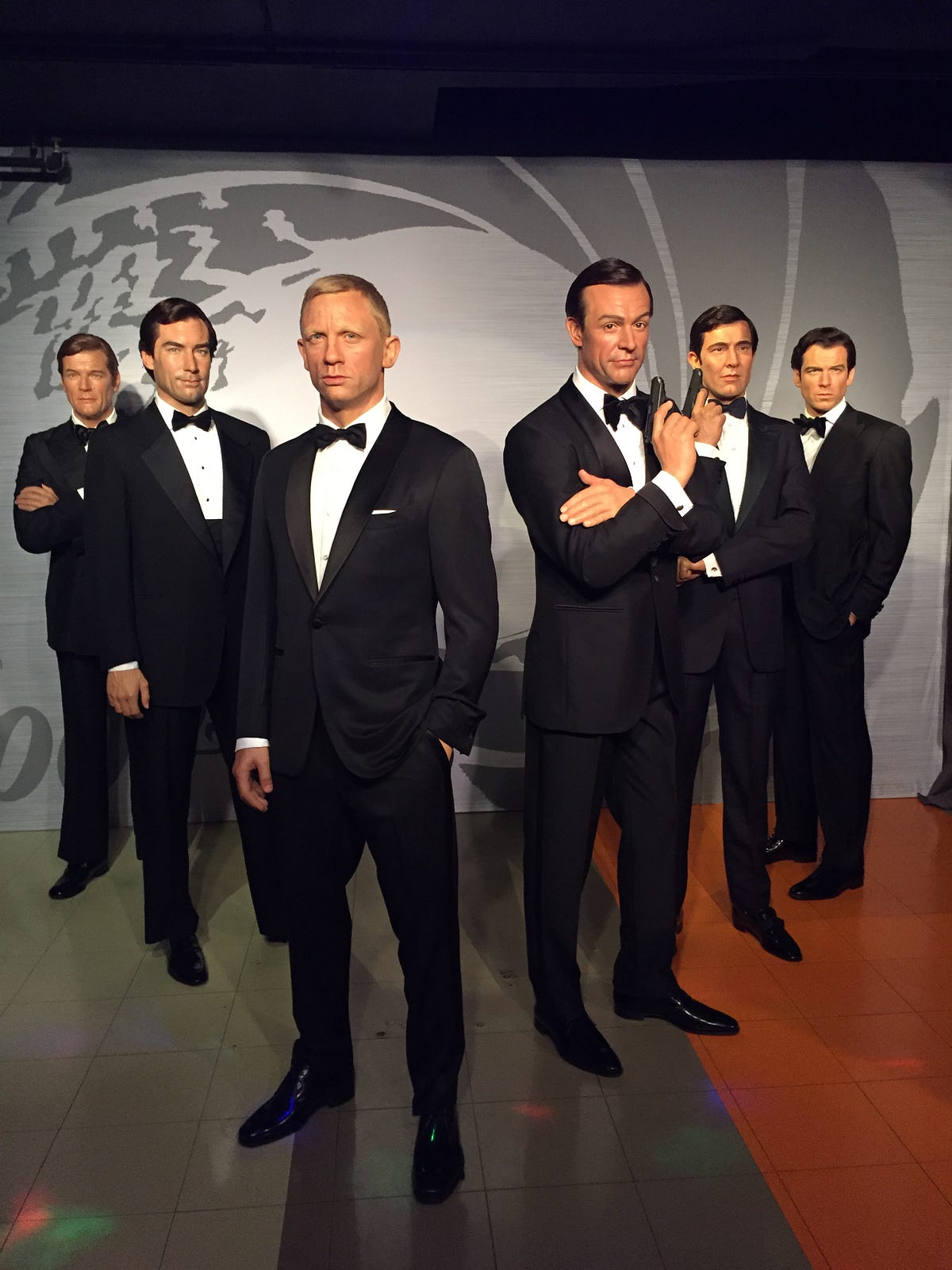 Madame Tussauds DC Has All Six James Bonds | by Nell Minow | Medium