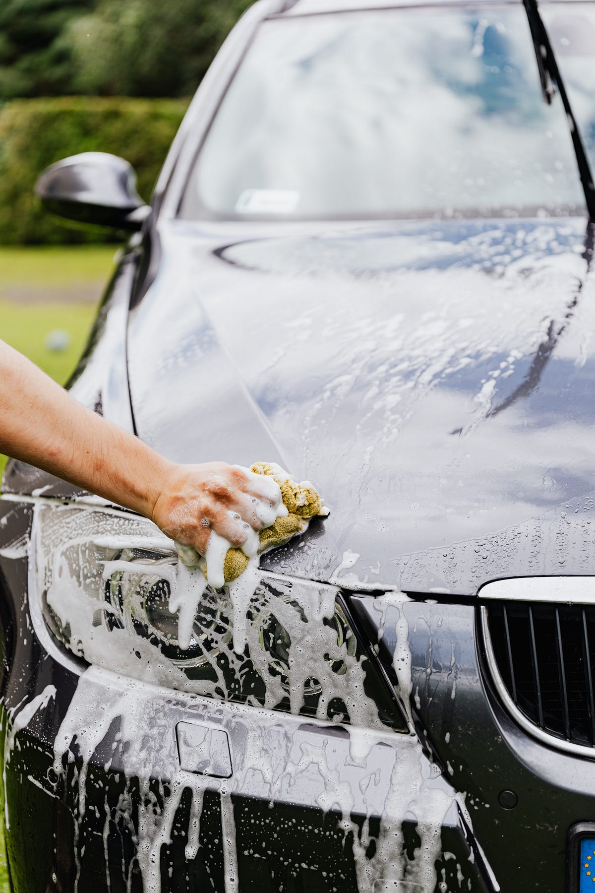 Where can I hand wash my car in Calgary? by Top Gear Car Wash Medium