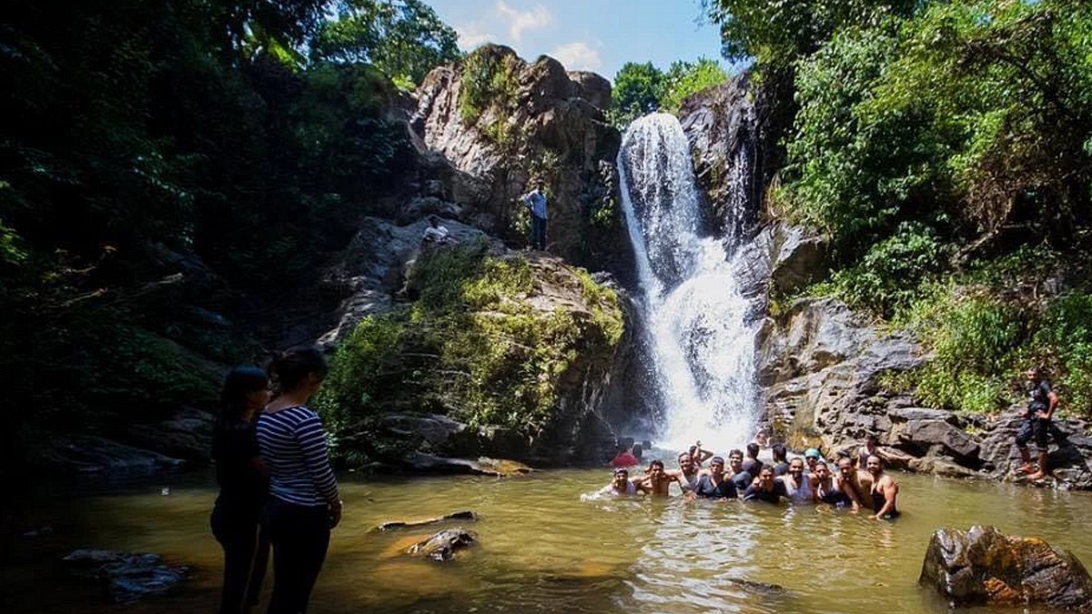 Adventure Resort in Bangalore. A lush green hillside surrounds the Q ...