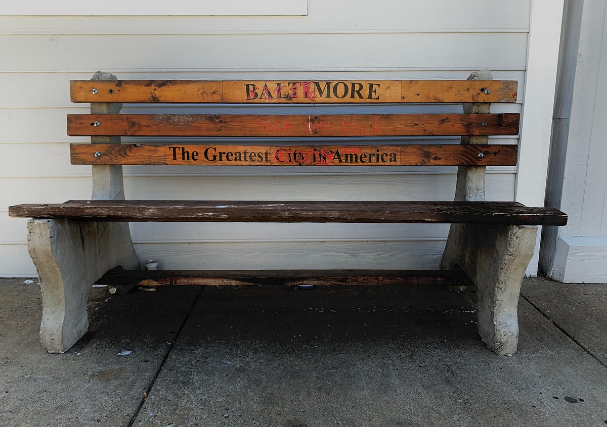 What's with those “The Greatest City In America” benches?