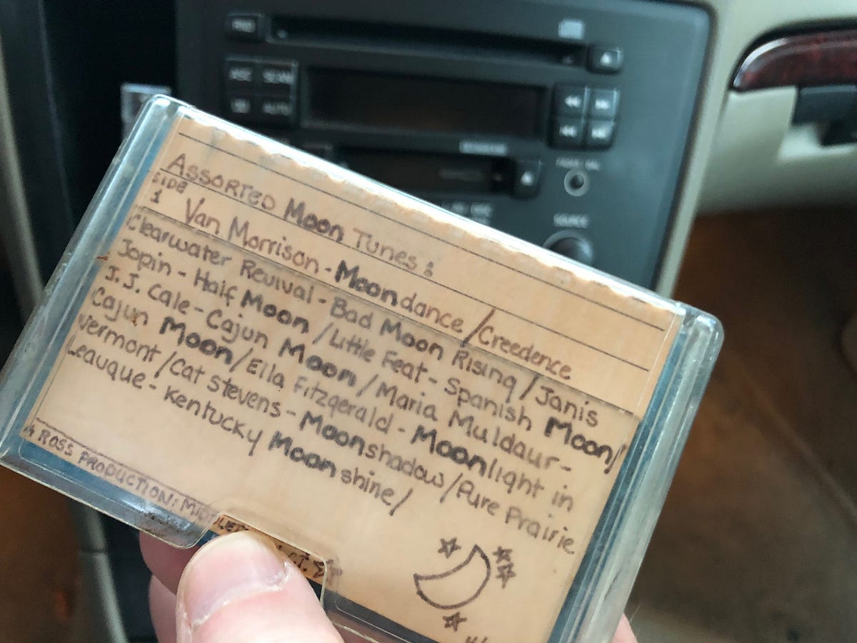 Moon Tunes. “Listen to this,” I announce, holding… by Steve Mooney