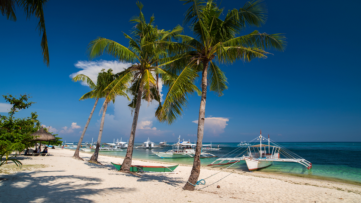 Malapascua Island after Typhoon Haiyan by Jona Branzuela Bering Medium photo