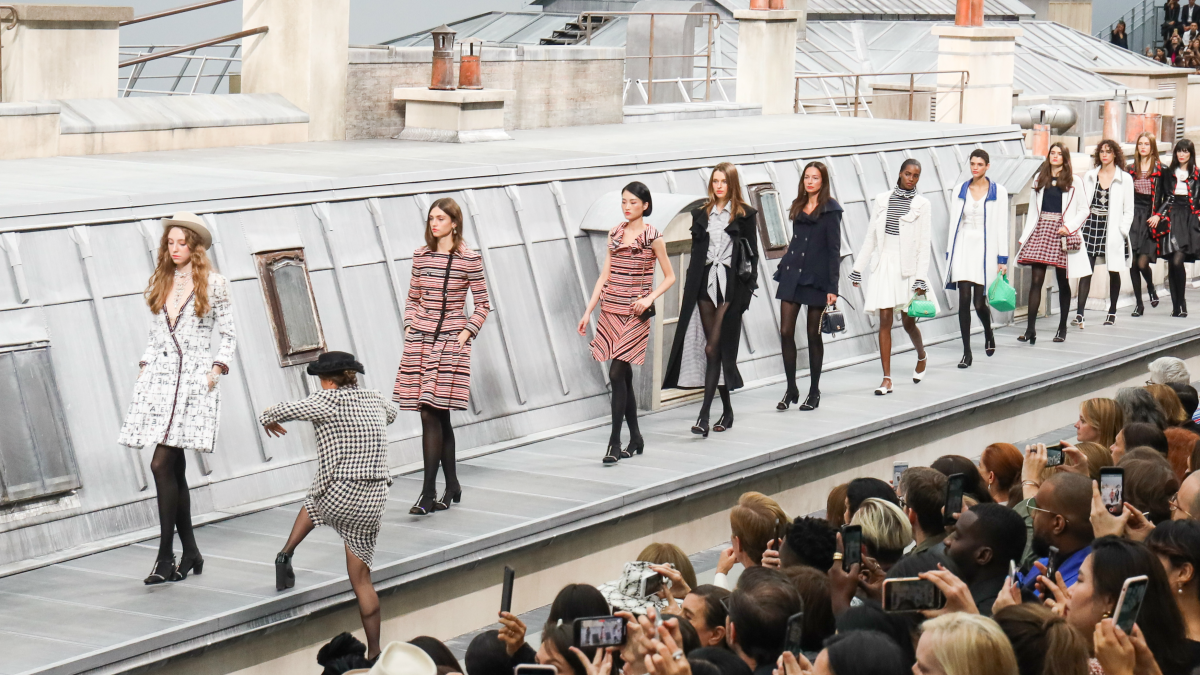 Vuitton stages style history wall, Chanel goes pared-down