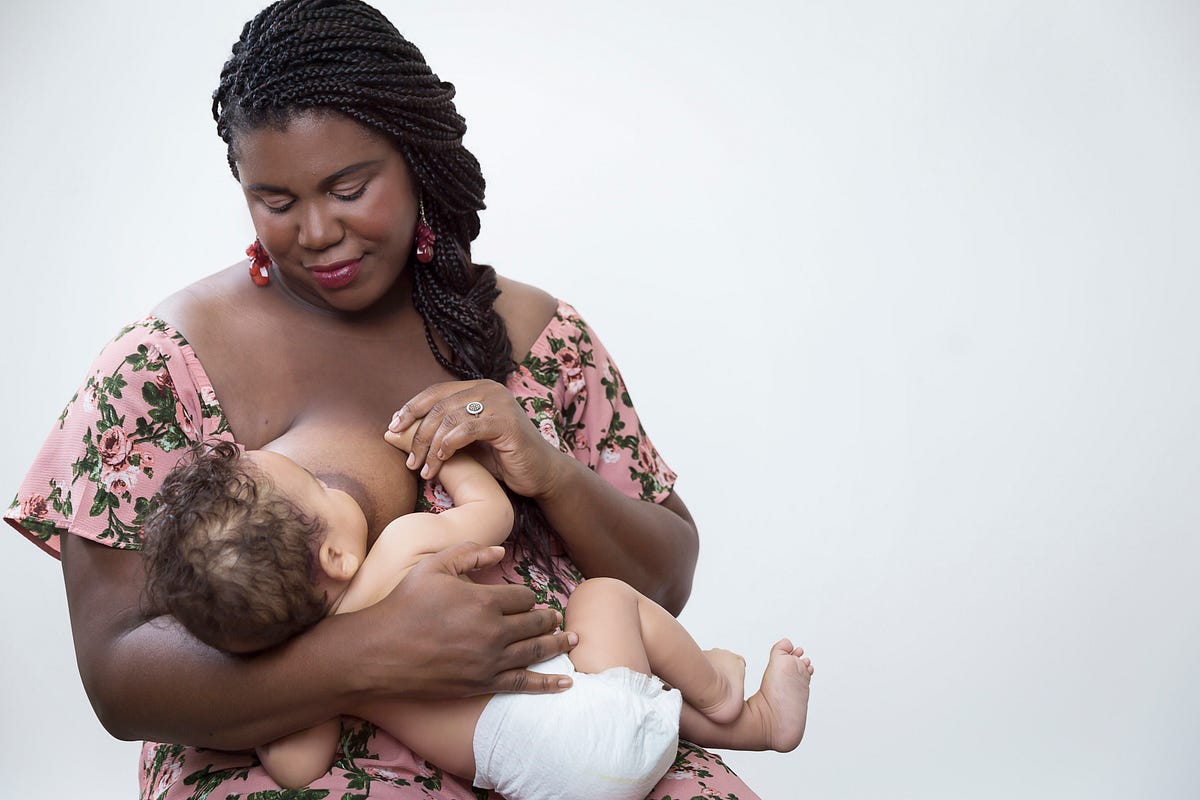 Ebony breastfeeding white man