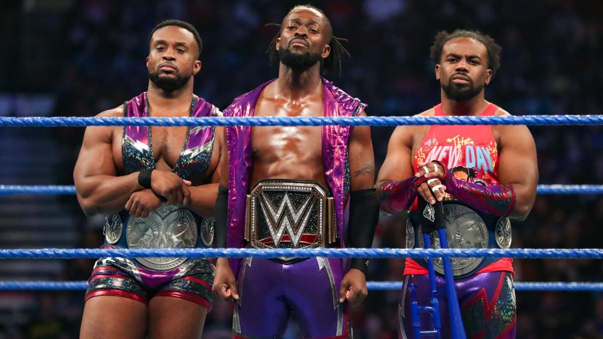 All rights to WWE. Kofi in the middle, Big E(L) Xavier Woods(R)