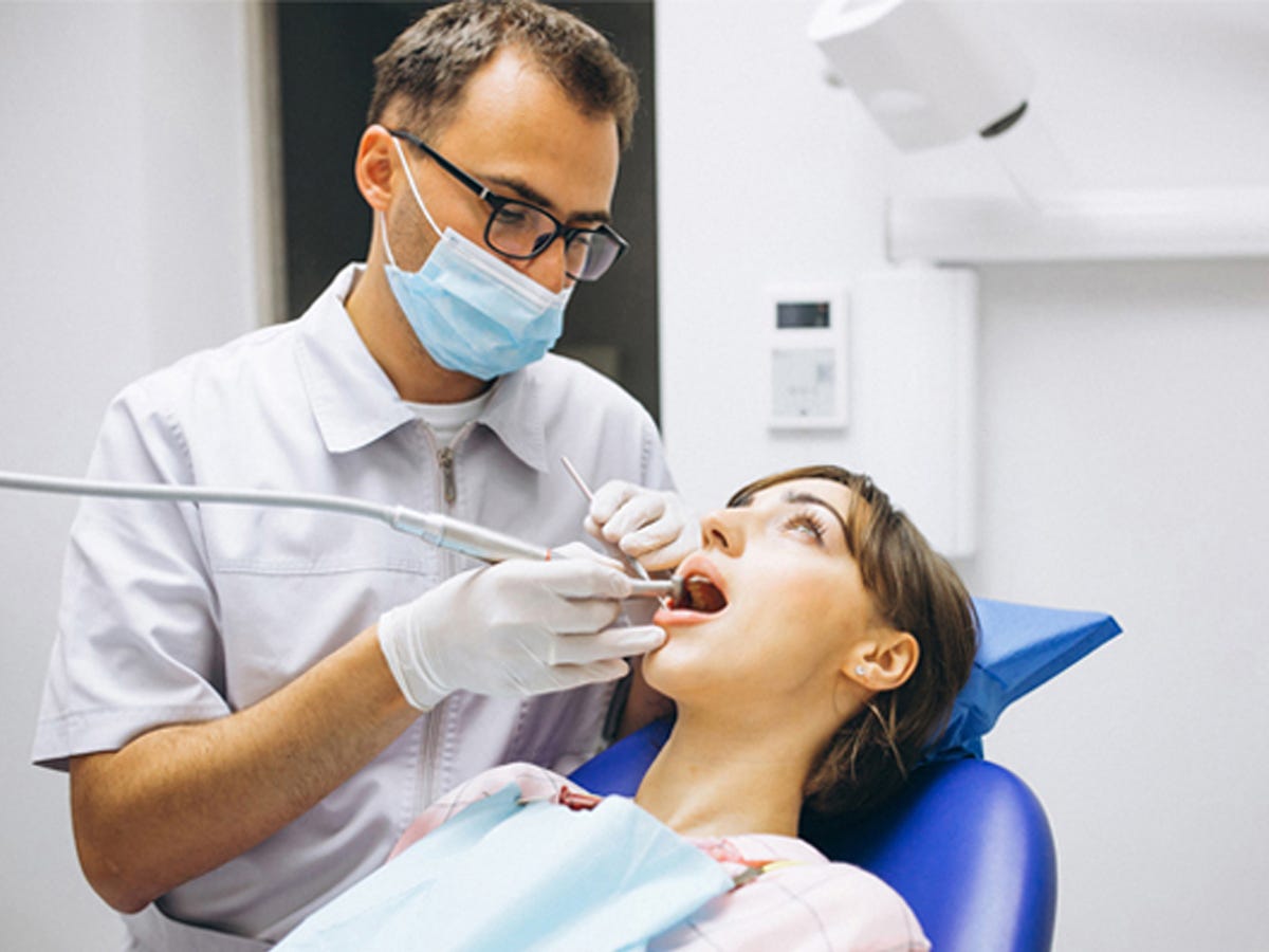 What Hurts More, Root Canal Or Tooth Extraction? by Implant Dentistry