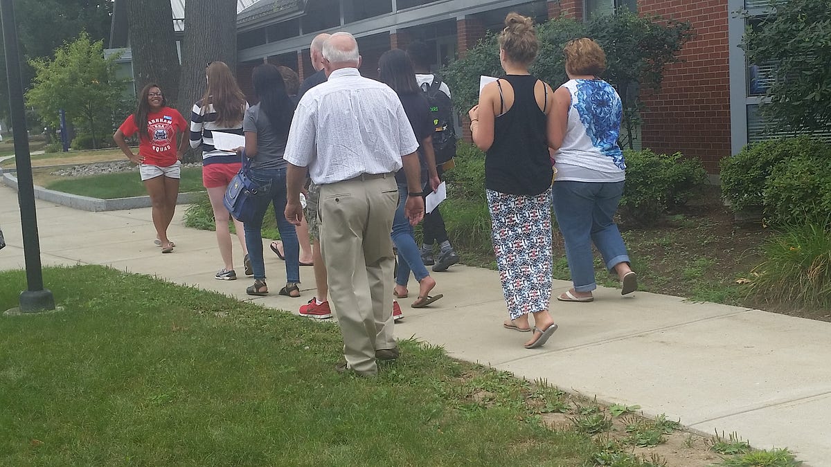 This is a photo of Kazi Thomas giving a tour on campus. by Edgar