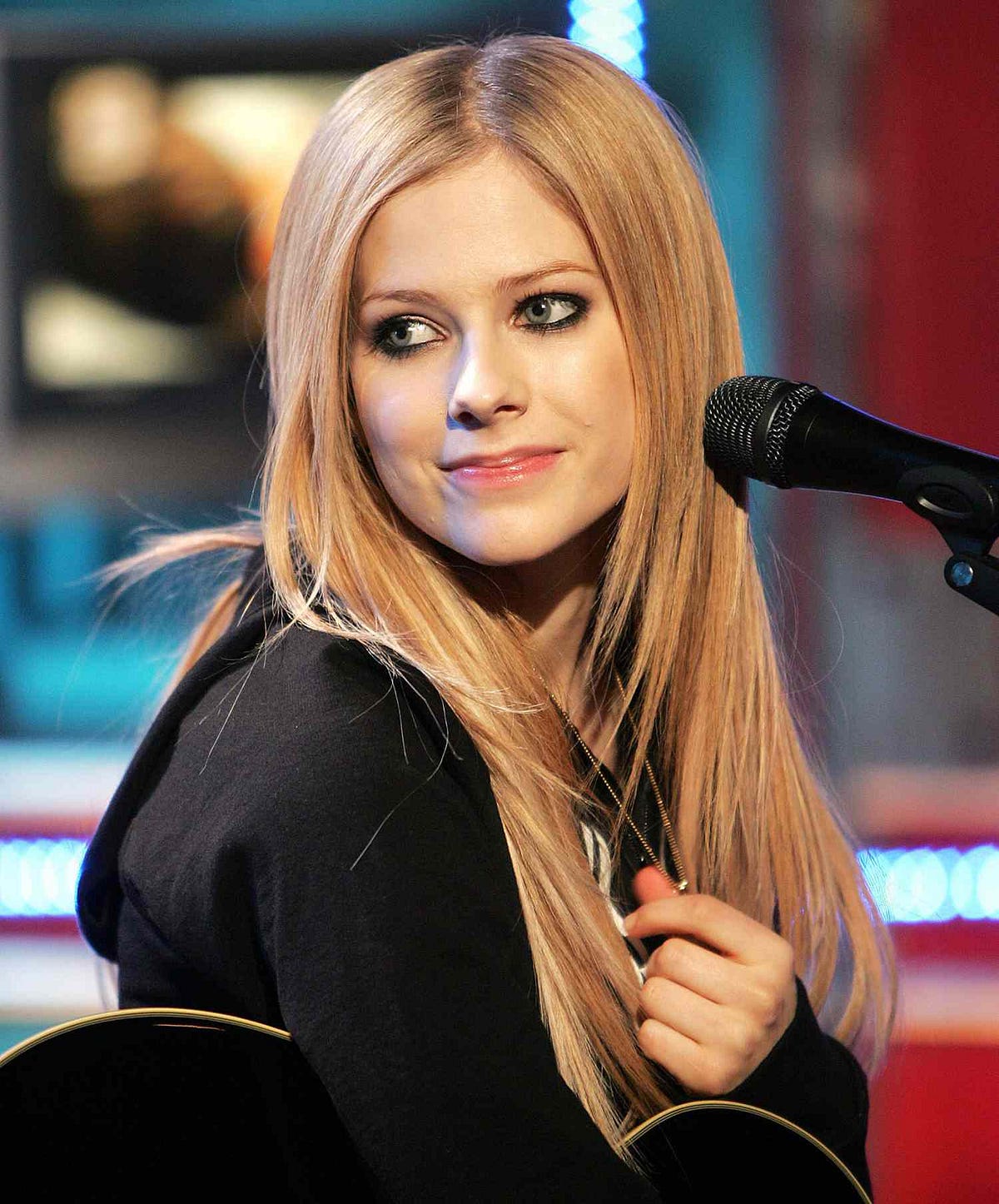 Avril Lavigne: A Rockstar’s Journey Through Music and Resilience | by