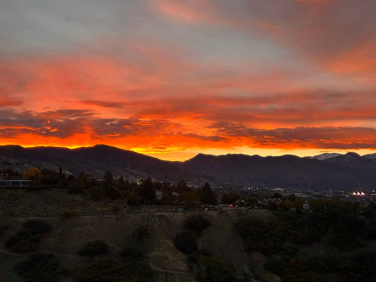 Sunrise Over Salt Lake City On The Day Of The Eclipse by Floyd Mori
