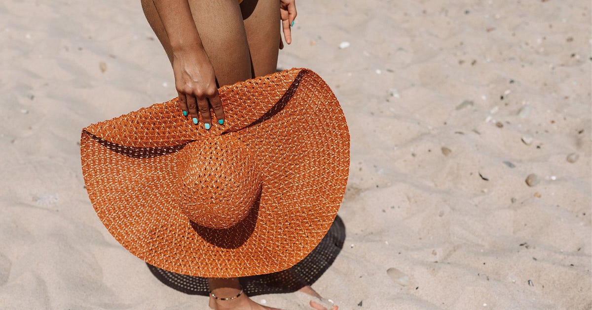 SunKissed Glow Unveiling the 3 Best Home Spray Tan Kits for