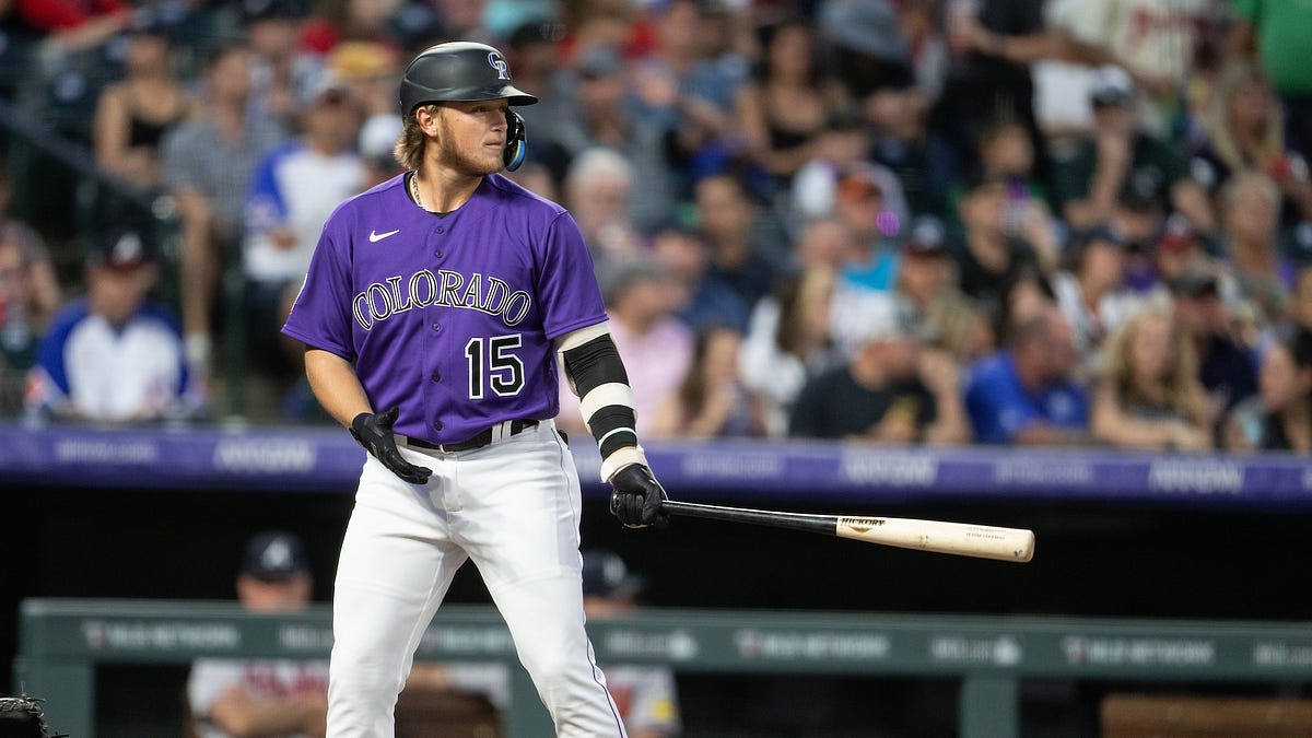 Evan Justice of the Colorado Rockies pitches in his major league