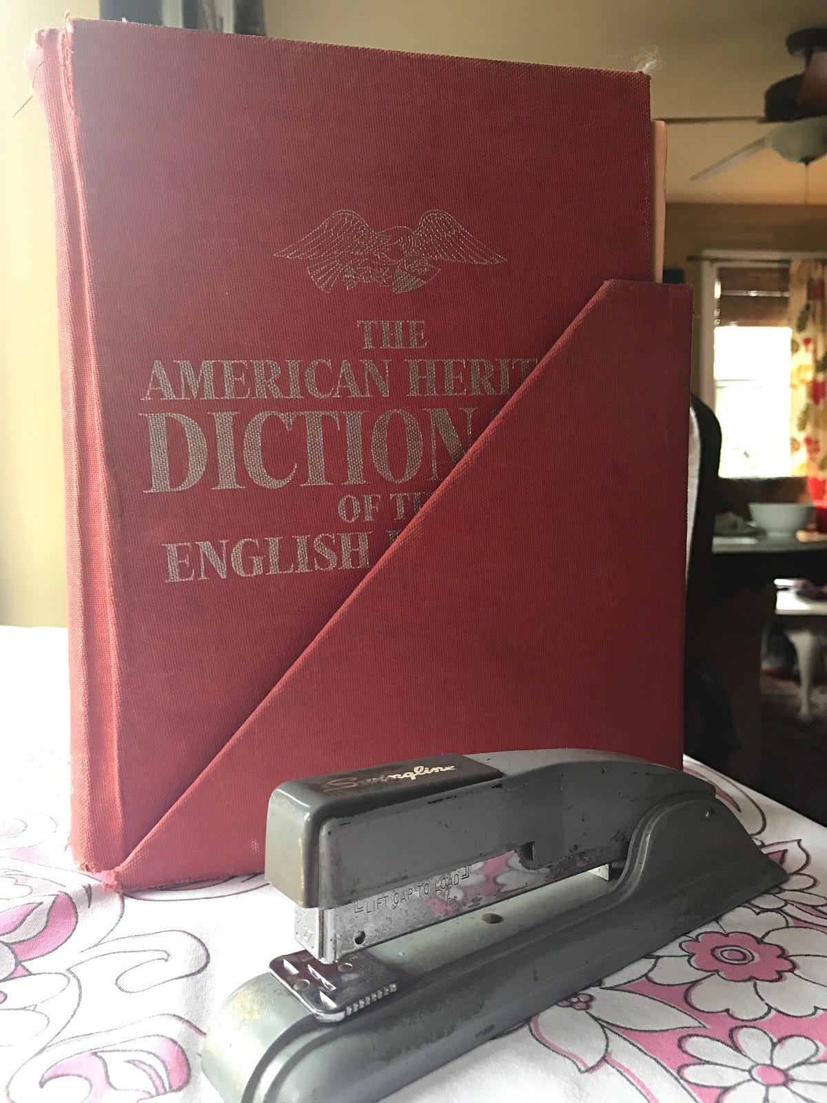 THE STAPLER; PART ONE. The red dictionary in its self… by alayne