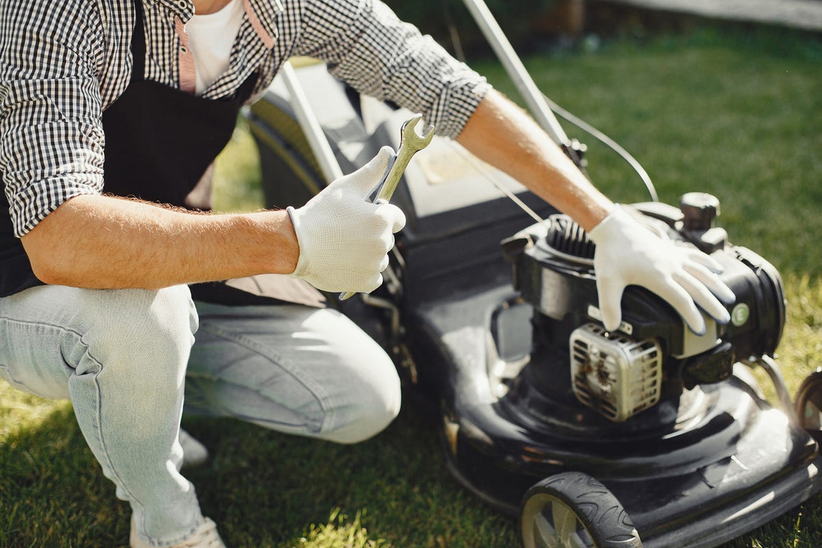 How often do I have to change the spark plug on my lawn mower? by
