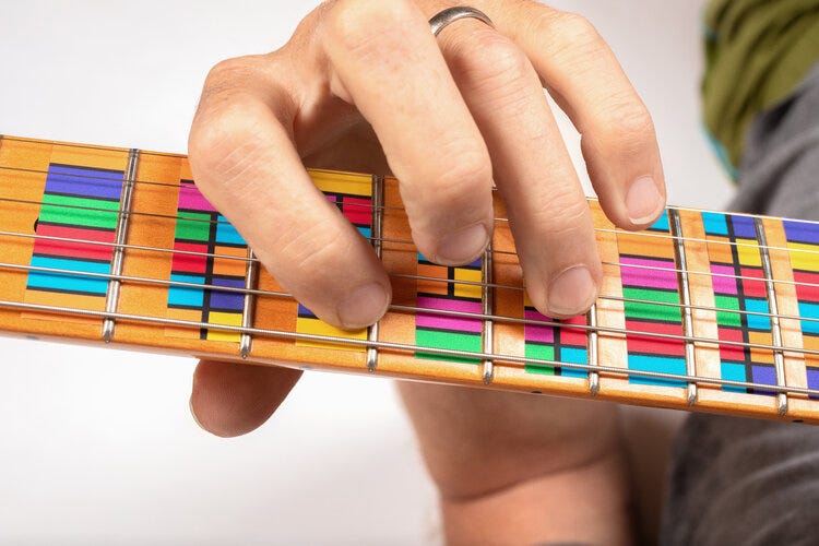 Unlocking the Fretboard Learn Guitar Faster with Musical Colors