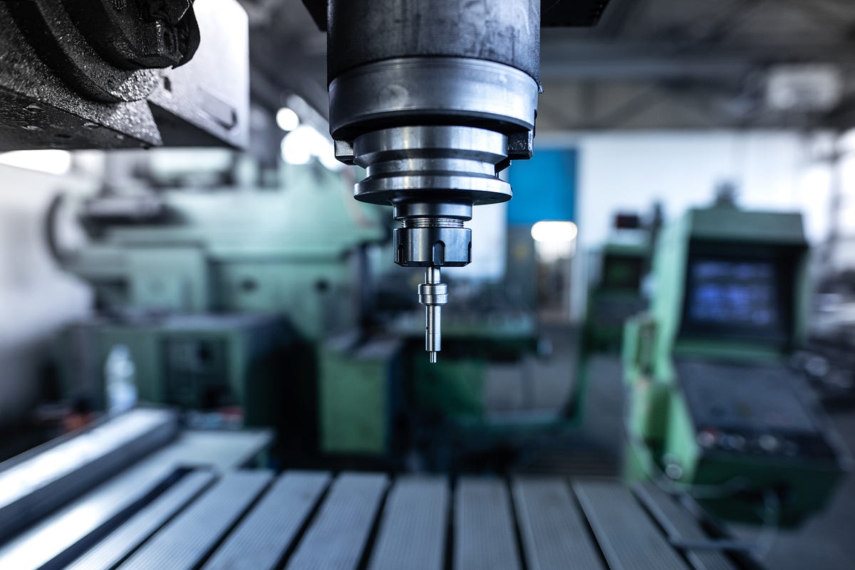 What is the difference between VMC and CNC Machines? | Medium