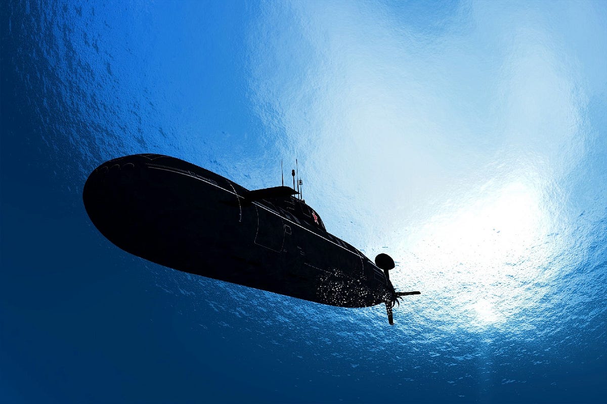 What makes a Submarine sink, but not enough to reach the ground? by