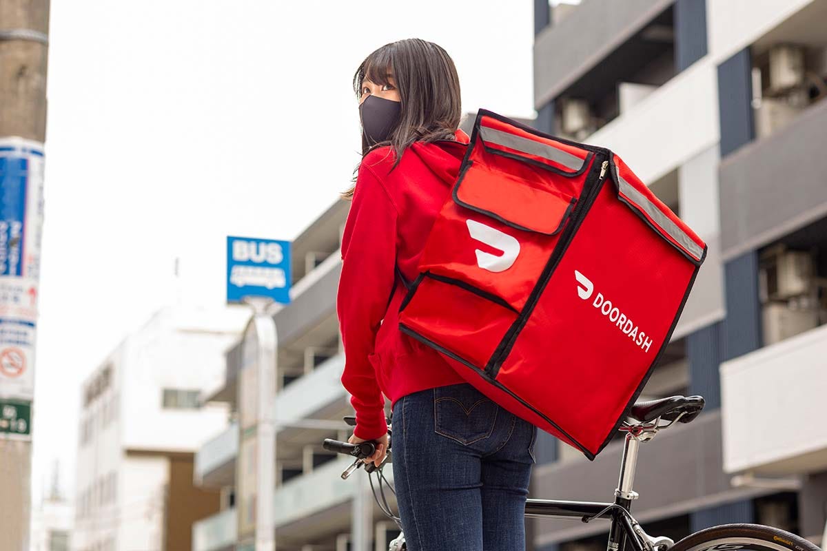 DoorDash launches in Japan as food delivery war heats up - Nikkei Asia