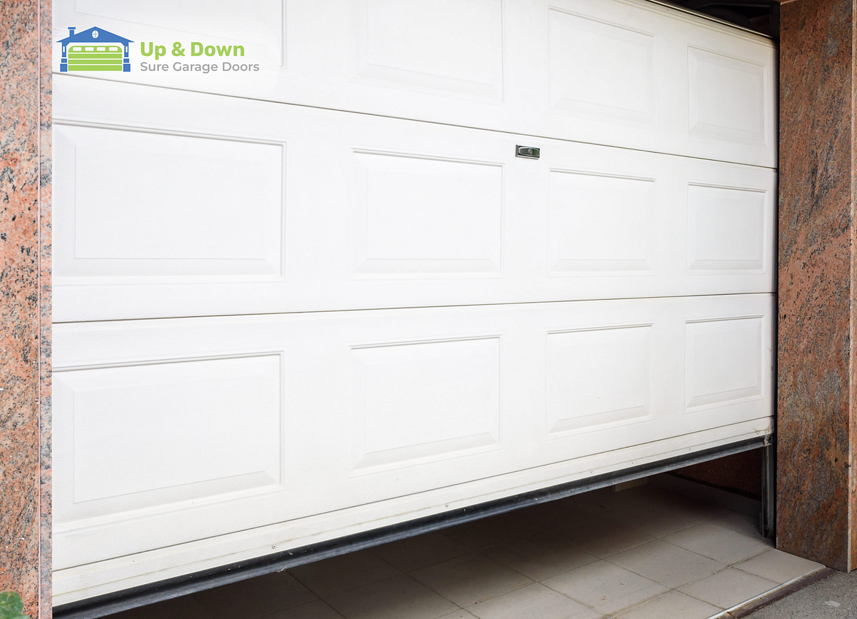How To Reset A Garage Door After A Power Outage by Up & Down Garage