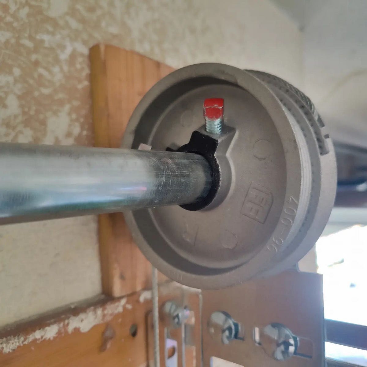 Garage Door Pulley Wheel Replacement and Repair Ensuring Smooth Door