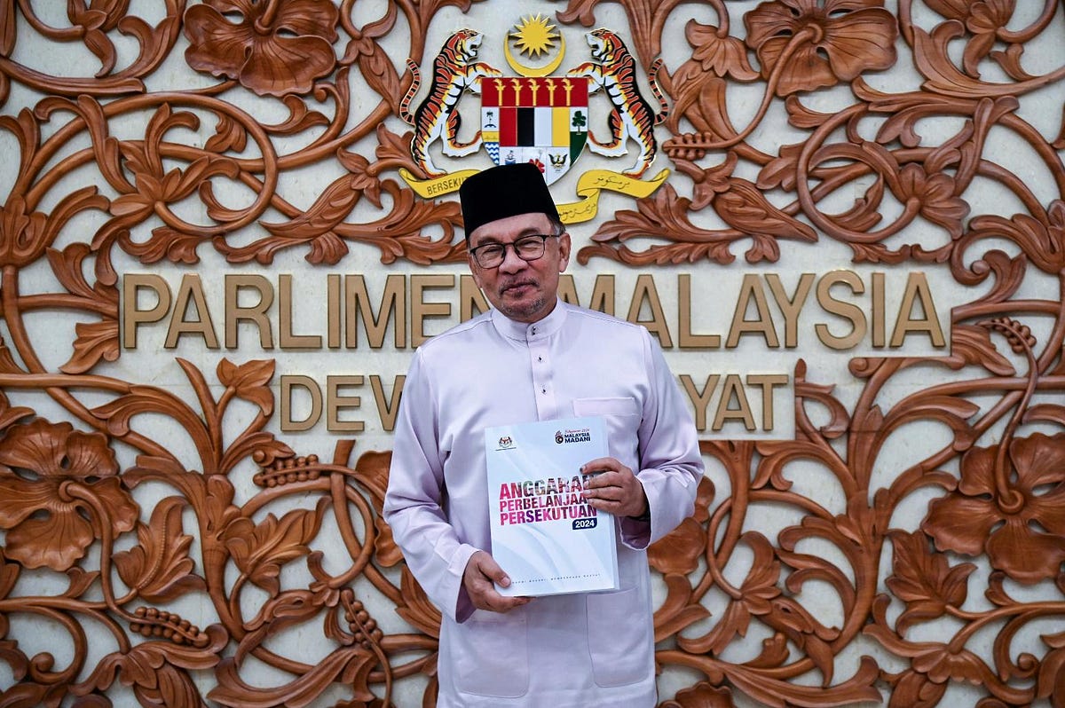 Malaysia Unveils 2024 Budget With Subsidy Cuts and New Taxes On Luxury