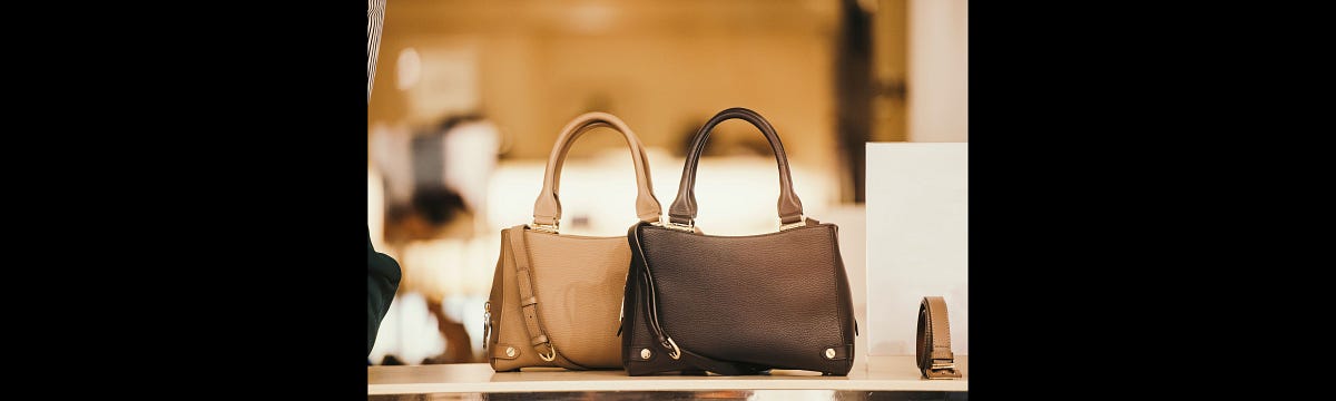 The Enduring Allure of Luxury Handbags: A Symbol of Status, Investment, and Elegance  by 