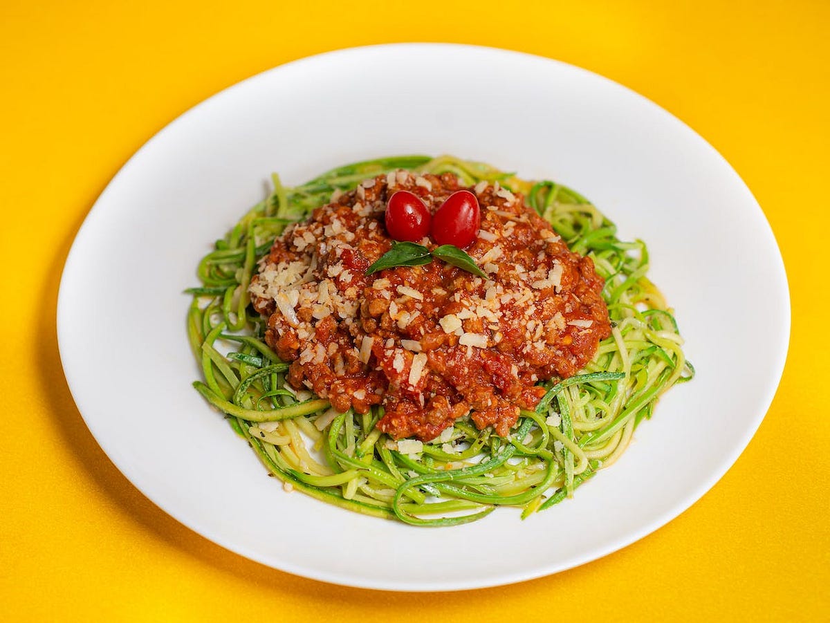 Zucchini Noodles with Pesto and Cherry Tomatoes by Kelly Addams Medium