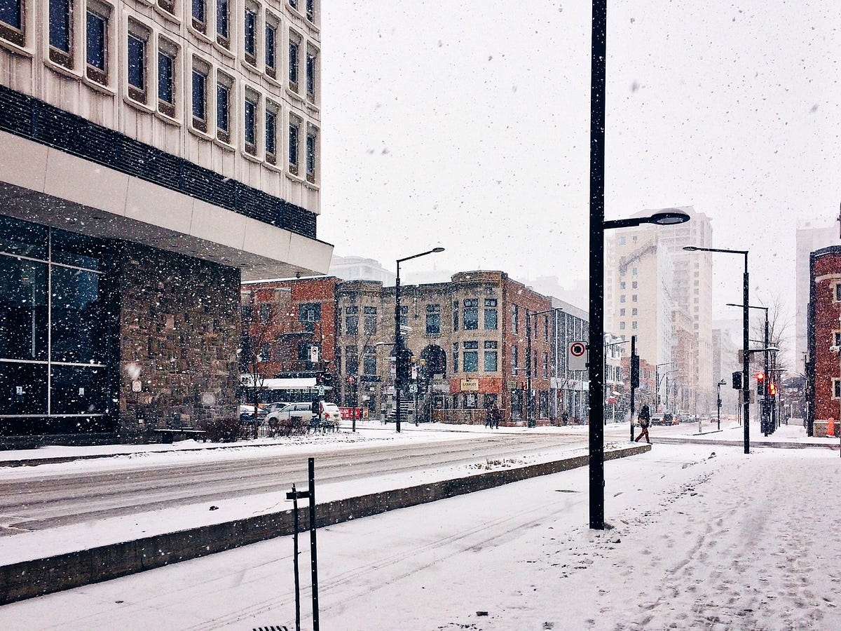 Why does snow melt faster on the sidewalk than it does on grass? by