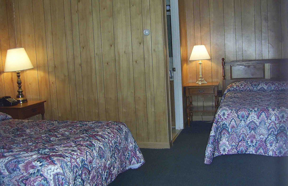 Sunset Motor Lodge. Like the vacancy light shorted out with… by Dan